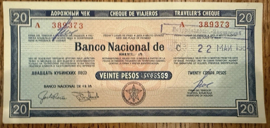 Caribbean denomination 20 used travelers check / travellers cheque0